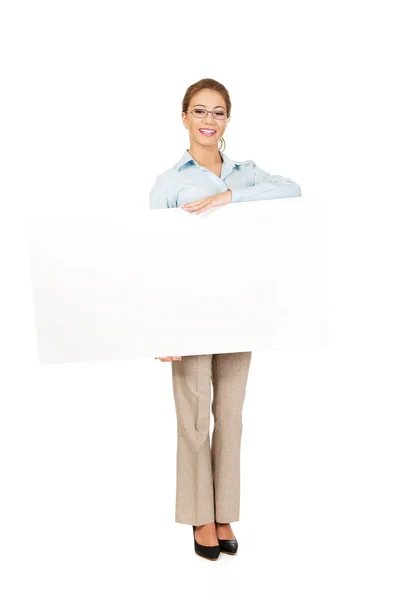 Business woman presenting your product. — Stock Photo, Image