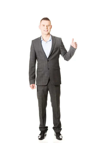 Young businessman gesturing ok sign — Stock Photo, Image