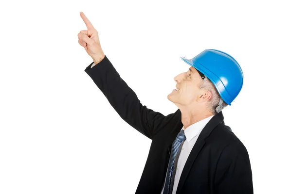 Businessman engineer pointing up — Stock Photo, Image