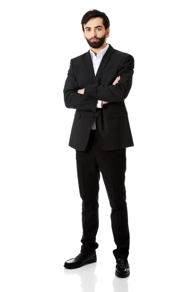 Smiling businessman with folded arms. — Stock Photo, Image