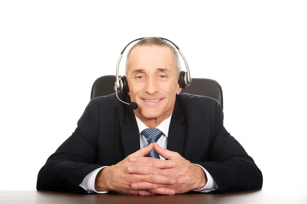 Call center man sitting in the office — Stock Photo, Image