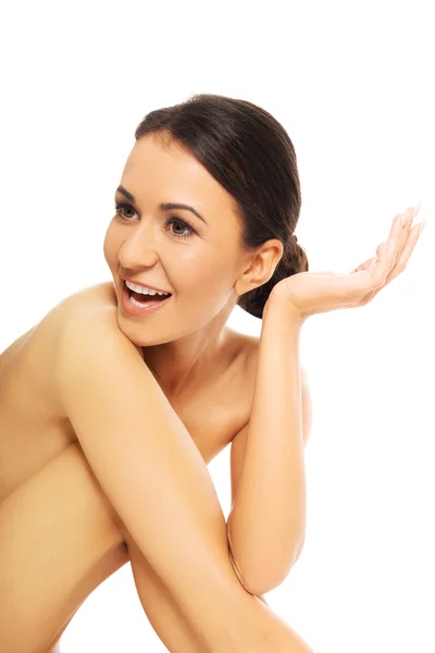 Beautiful laughing spa woman sitting — Stock Photo, Image