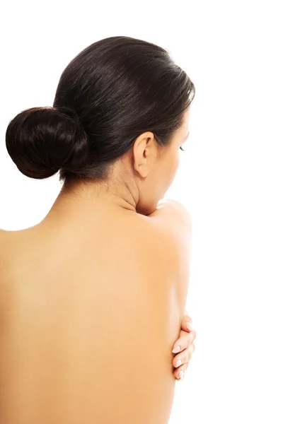 Espalda desnuda de una hermosa mujer — Foto de Stock