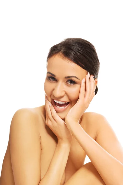 Beautiful laughing spa woman sitting — Stock Photo, Image