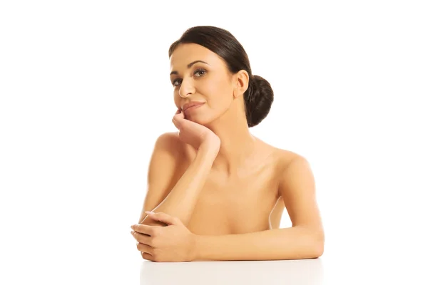 Spa woman sitting at the desk — Stock Photo, Image