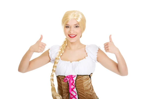 Woman in Bavarian dress with thumbs up. — Stock Photo, Image