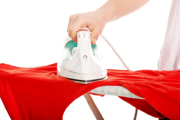 Young woman does the ironing. — Stock Photo, Image