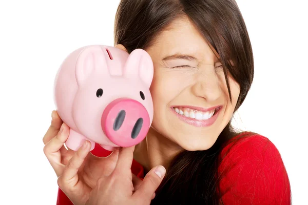 Happy woman with piggybank. — Stock Photo, Image