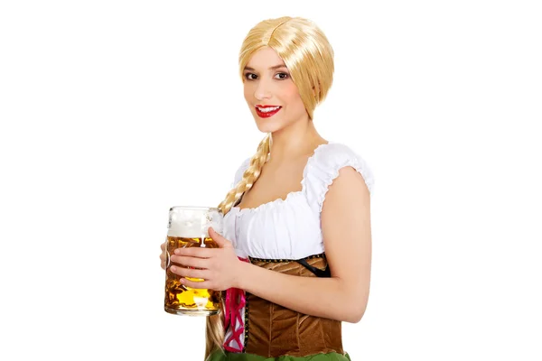 Beautiful bavarian woman with beer. — Stock Photo, Image