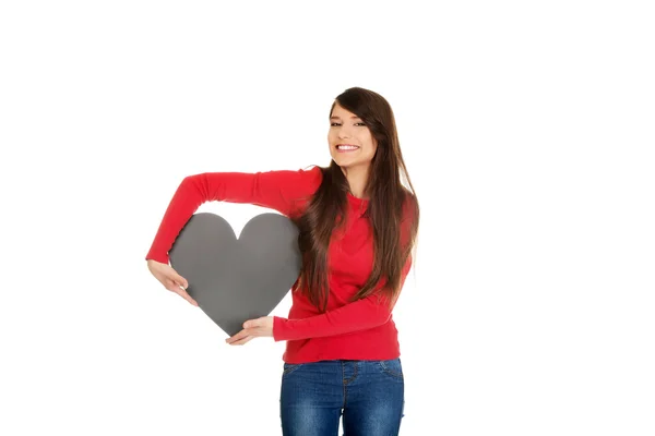 Woman with heart made from paper. — Stock Photo, Image