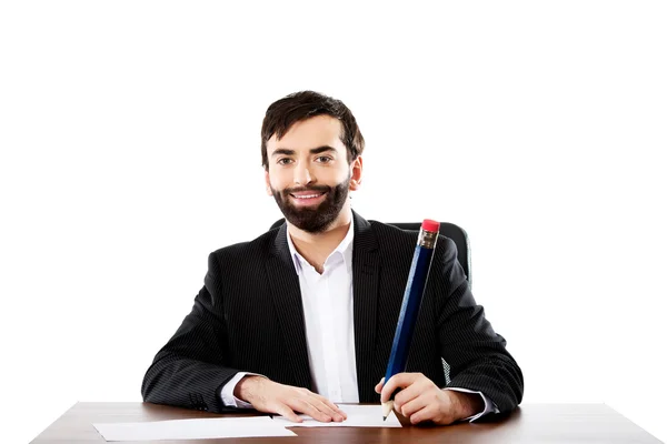 Businessman writing in the office — Stock Photo, Image