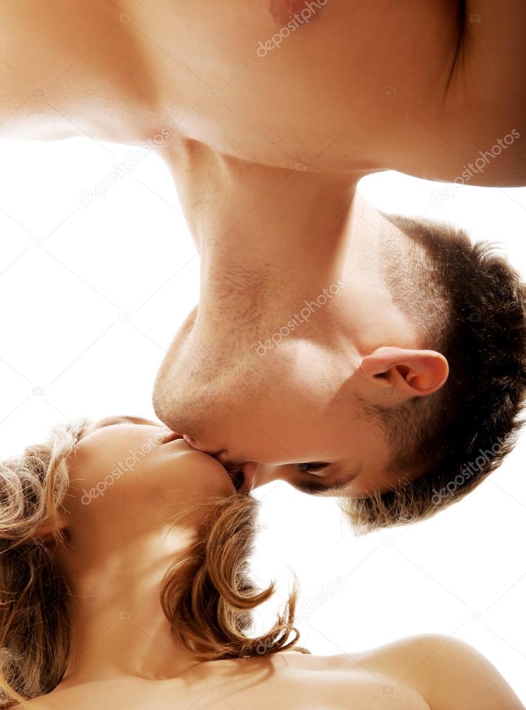 Young couple kissing.