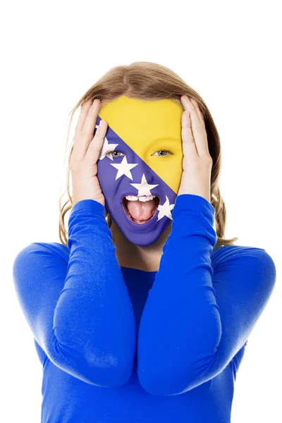 Bosnia and Herzegovina flag on woman's face. — Stock Photo, Image