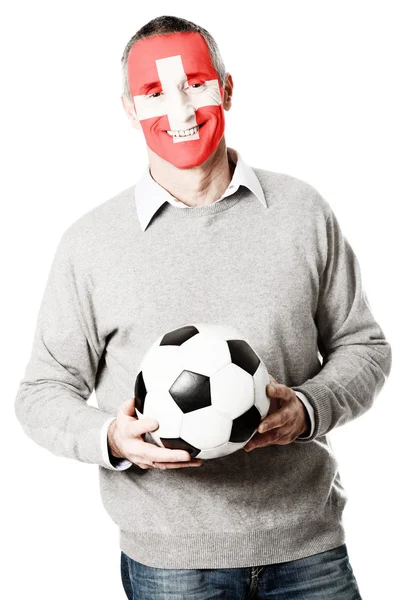 Dojrzały człowiek flaga Szwajcarii na twarz. — Zdjęcie stockowe