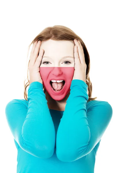 Mulher com bandeira polonesa no rosto . — Fotografia de Stock