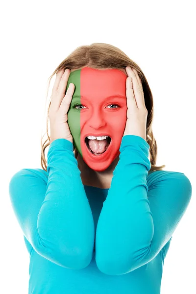 Woman with Portugal flag on face. — Stock Photo, Image