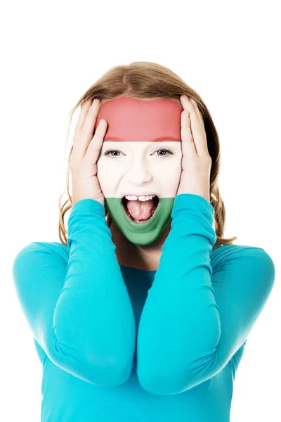 Woman with Hungary flag on face. — Stock Photo, Image