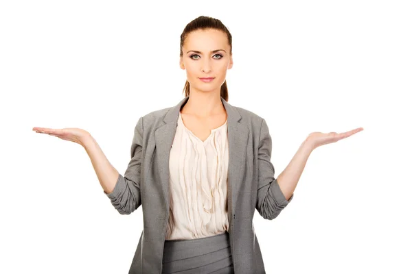 Businesswoman showing two empty hands. — Stock Photo, Image