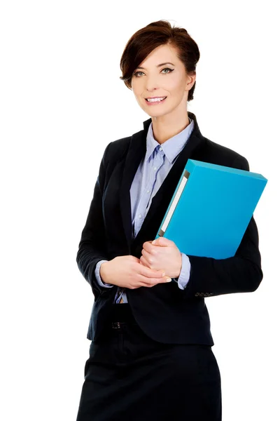 Businesswoman holding a binder. — Stock Photo, Image