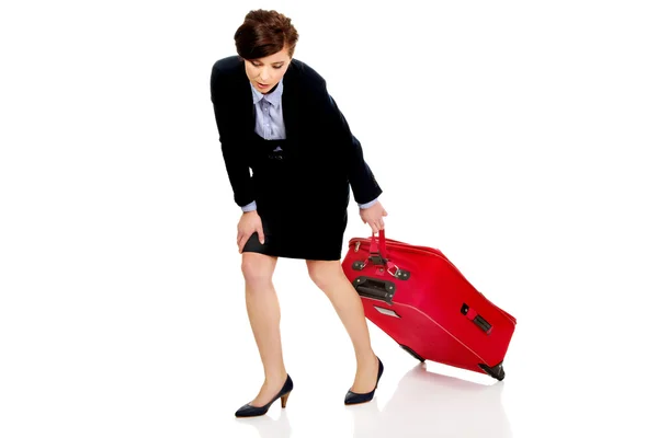 Femme d'affaires fatiguée avec valise . — Photo