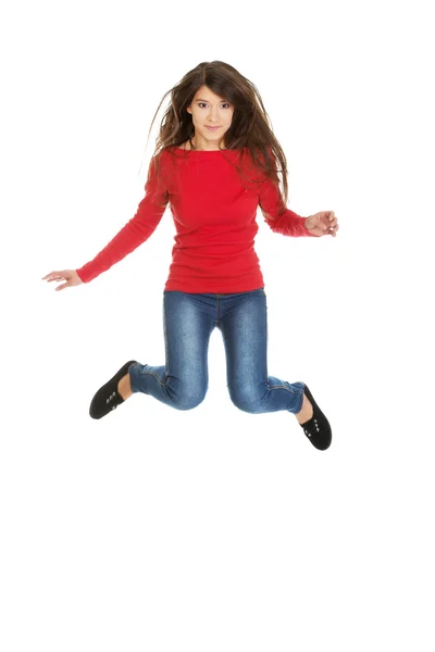 Młoda kobieta studenta skoki. — Zdjęcie stockowe