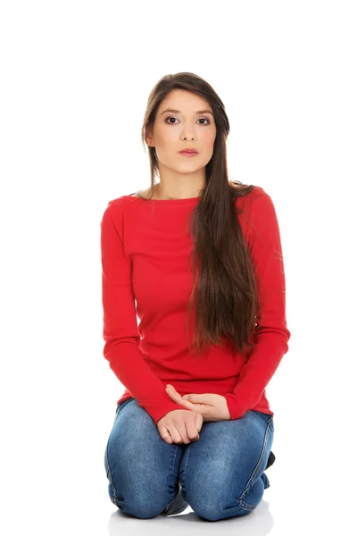 Relaxing woman sitting on the floor. — Stock Photo, Image