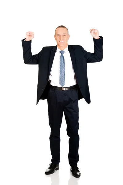 Successful businessman with arms up — Stock Photo, Image