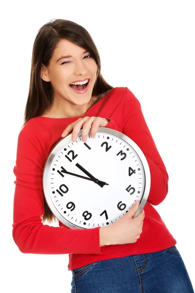 Schöne Frau mit der Uhr. — Stockfoto