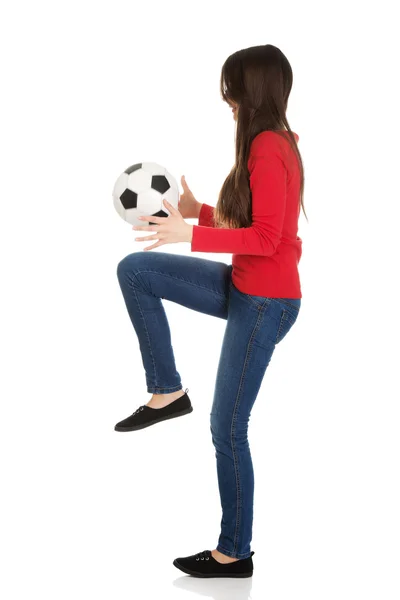 Woman with a soccer ball. — Stockfoto