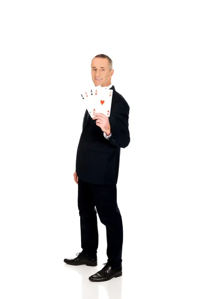 Businessman with four aces — Stock Photo, Image