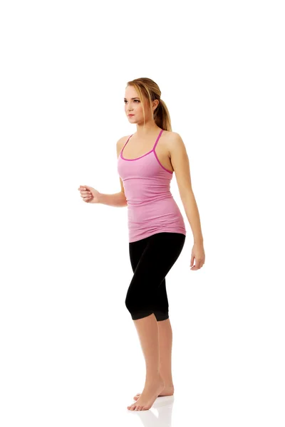 Young woman doing aerobic exercise. — Stock Photo, Image