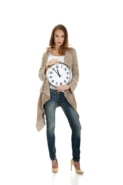 Happy woman with clock. — Stock Photo, Image