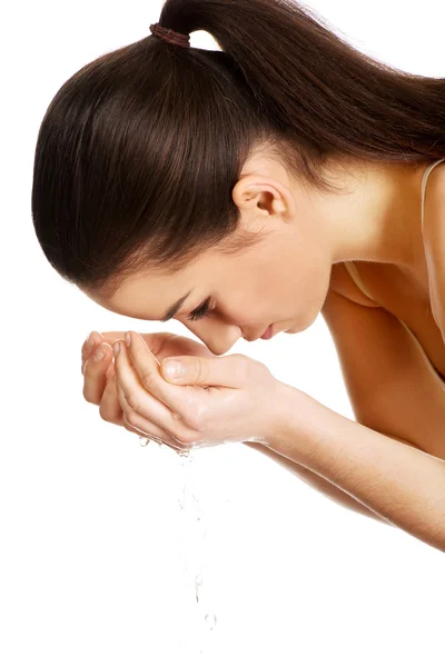 Woman washing her clean face. — Stock Photo, Image