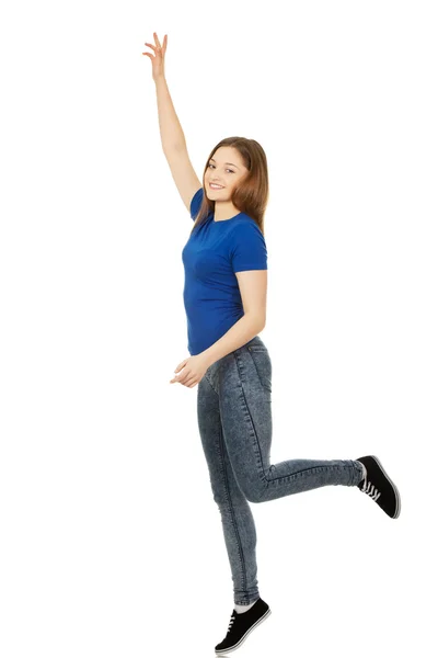 Joven mujer feliz con la mano arriba . — Foto de Stock