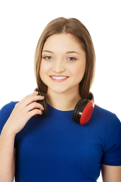 Tonåriga kvinna med hörlurar. — Stockfoto