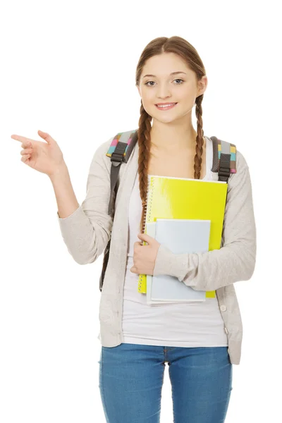 Estudante apontando para o lado . — Fotografia de Stock