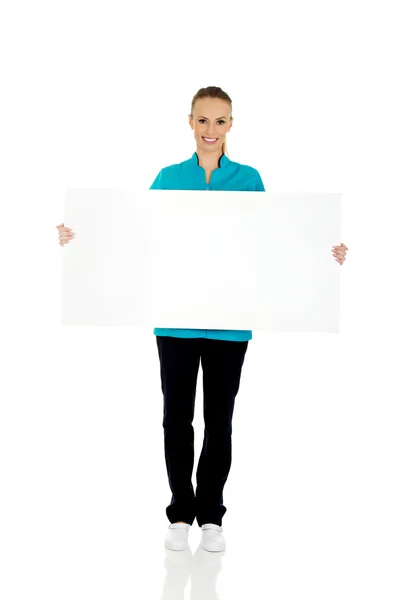 Medico femminile Holding Placard . — Foto Stock