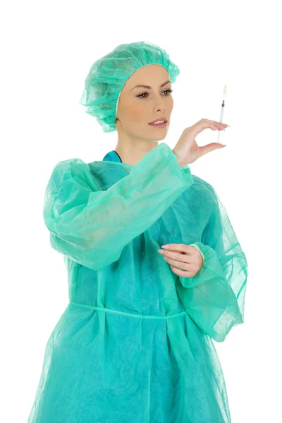 Surgeon doctor with a syringe in hand. — Stock Photo, Image