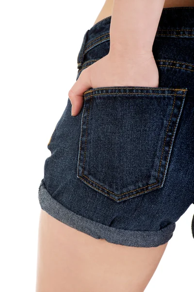 Kvinnans tillbaka i jeansshorts. — Stockfoto