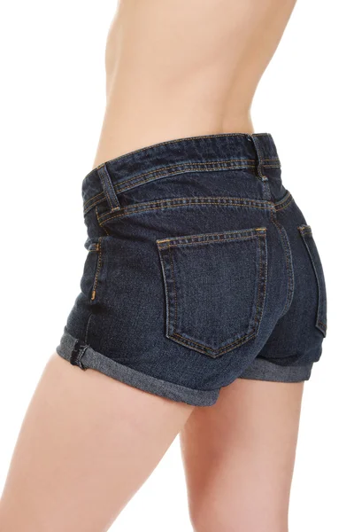 Sexig kvinna i jeans shorts. — Stockfoto