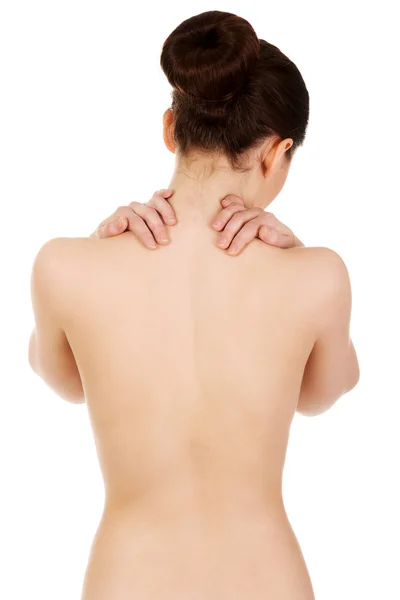 Mulher com dor nas costas por trás — Fotografia de Stock