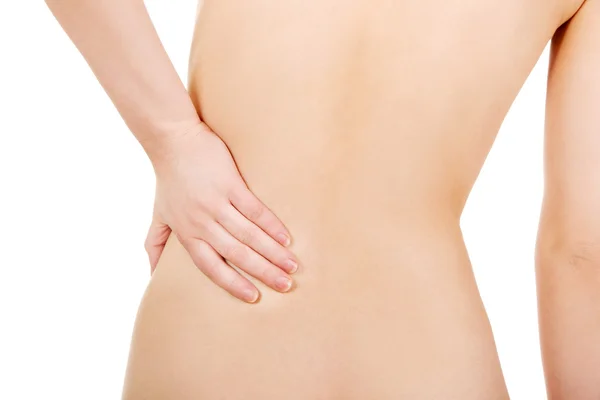 Frau mit Rückenschmerzen von hinten — Stockfoto