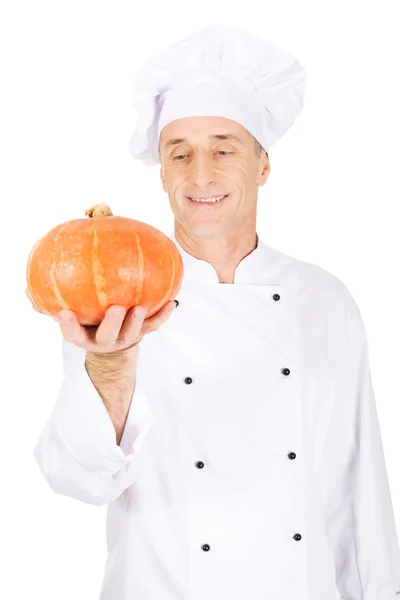 Chef maschio con una zucca — Foto Stock