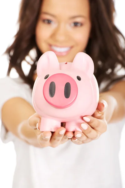 African woman with piggybank. — Stock Photo, Image