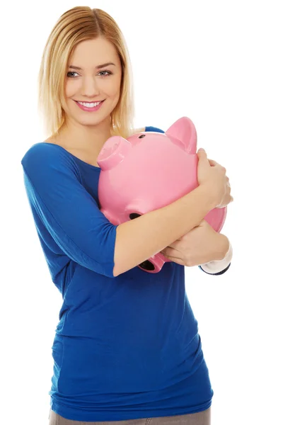Happy woman with piggybank. — Stock Photo, Image