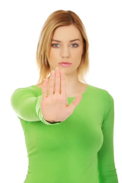 Frau macht Stoppschild mit der Hand. — Stockfoto