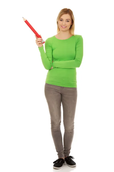 Woman pointing up with pencil. — Stock Photo, Image