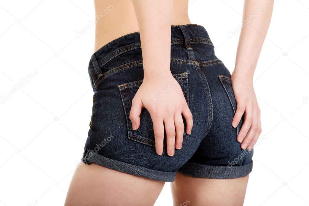 Sexy woman in jeans shorts.