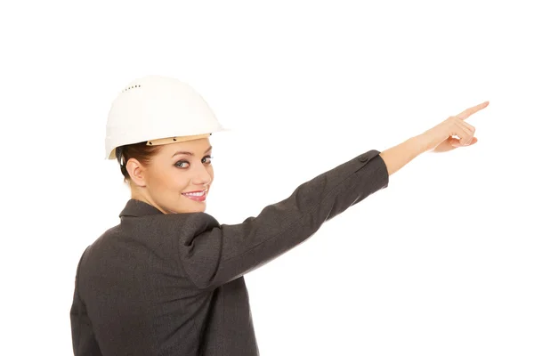 Young businesswoman pointing up. — Stock Photo, Image