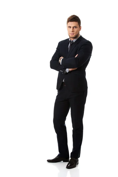 Successful businessman with folded arms. — Stock Photo, Image